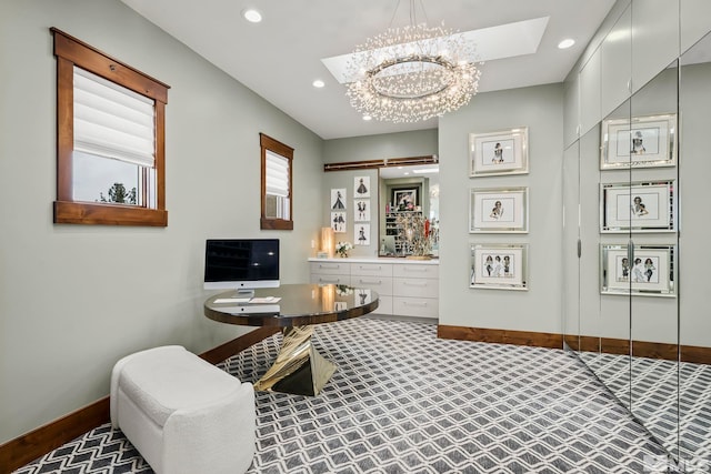 interior space with a skylight and a chandelier