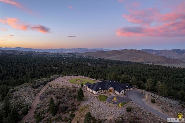 aerial view at dusk with a mountain view