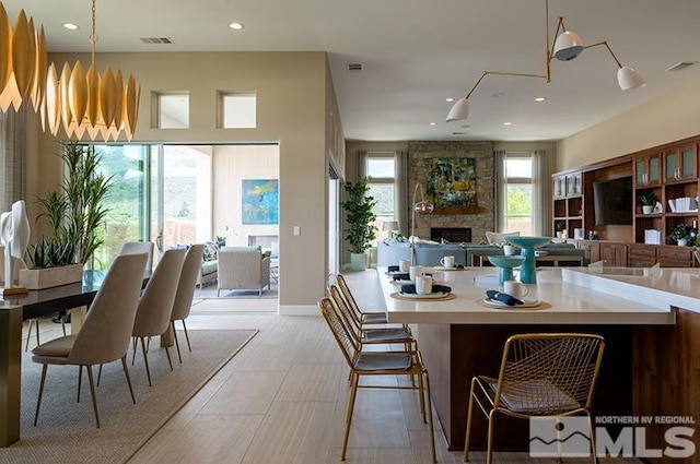 dining room featuring a fireplace