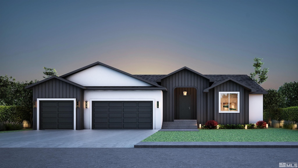 view of front of property featuring a garage