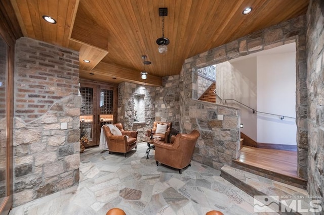 unfurnished room featuring wooden ceiling and light wood-type flooring