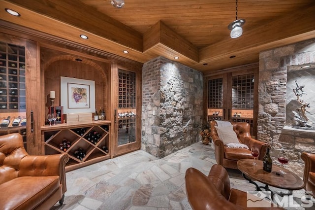 wine room with wooden ceiling