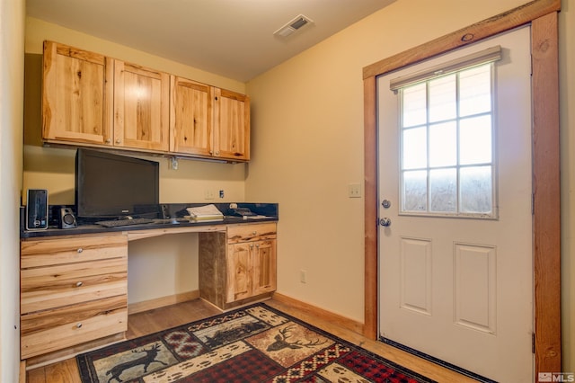 home office featuring light hardwood / wood-style flooring