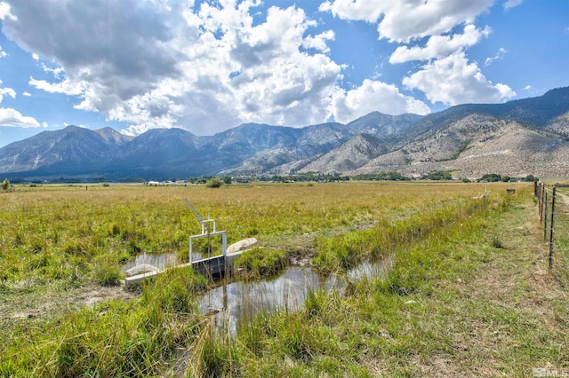 view of mountain feature with a rural view