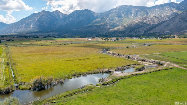 mountain view with a rural view and a water view