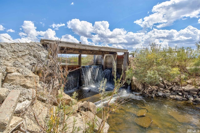 view of outdoor structure with a water view