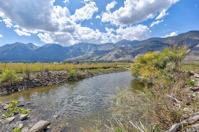 property view of mountains featuring a water view