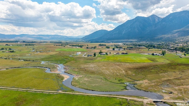 bird's eye view featuring a mountain view and a rural view