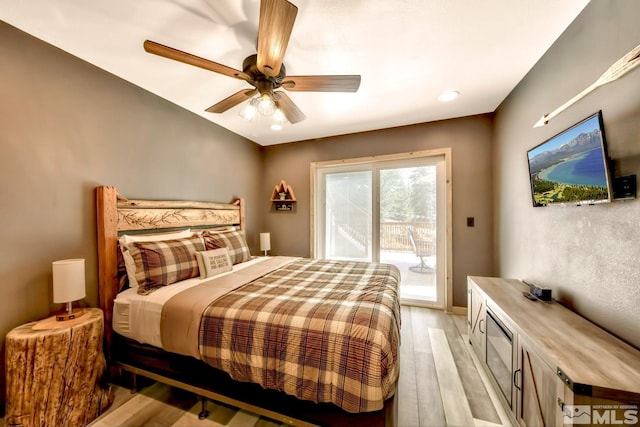 bedroom featuring ceiling fan, access to outside, and light wood-type flooring