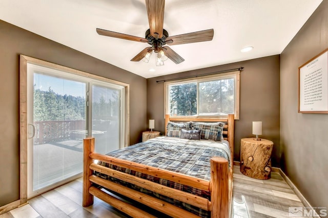 bedroom featuring ceiling fan, access to exterior, and light wood-type flooring