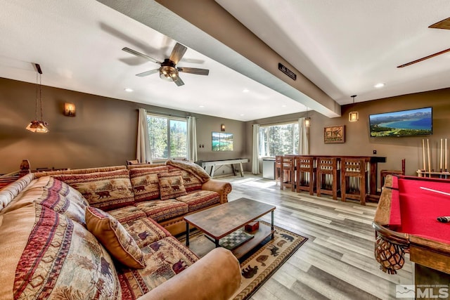 living room featuring billiards, ceiling fan, and light hardwood / wood-style flooring