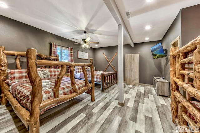 bedroom featuring ceiling fan and light hardwood / wood-style floors