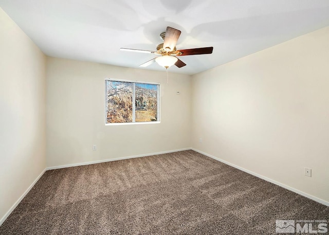 empty room with ceiling fan and carpet