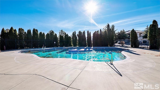 view of pool with a patio area