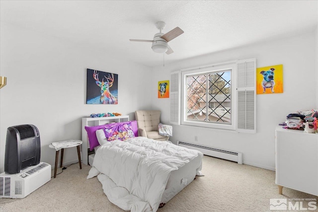 carpeted bedroom with ceiling fan and baseboard heating