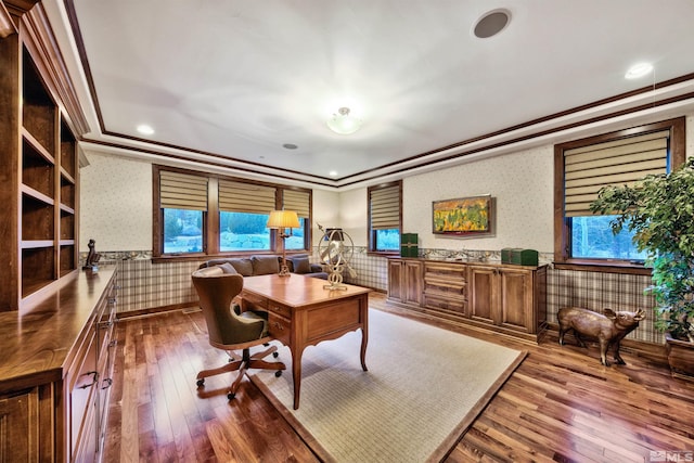 office area with dark hardwood / wood-style flooring and ornamental molding