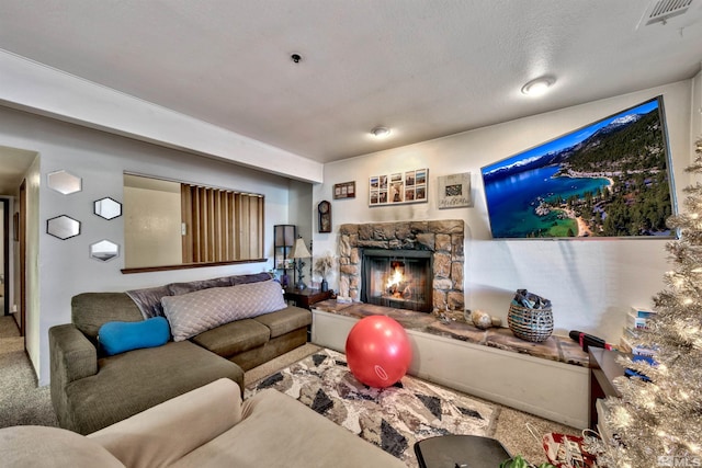 carpeted living room featuring a fireplace