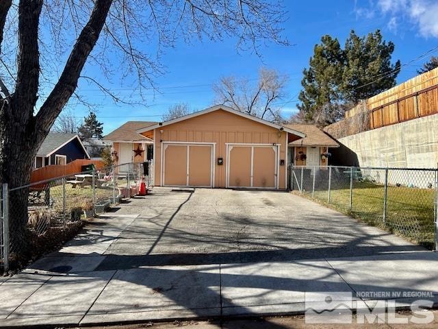 ranch-style house featuring a garage