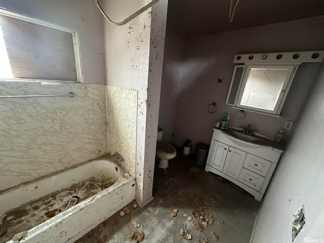 bathroom with a bathing tub, toilet, and vanity