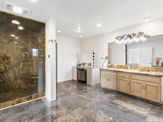 bathroom with oversized vanity and a shower with shower door