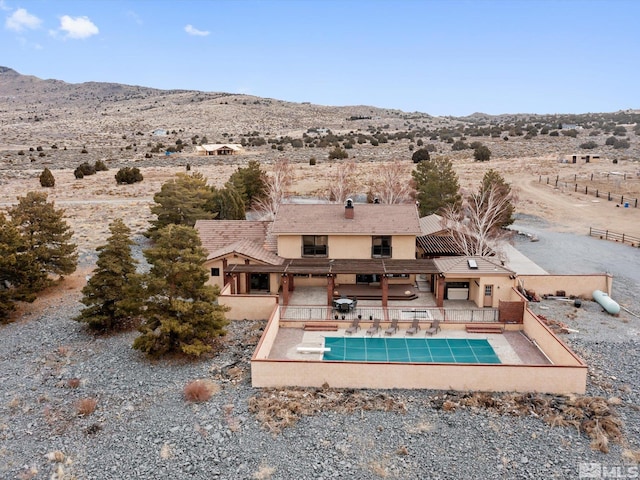 aerial view featuring a mountain view