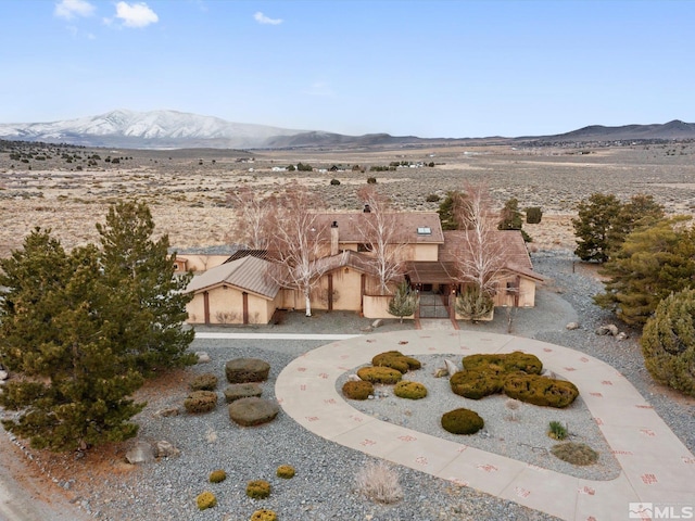 exterior space featuring a mountain view