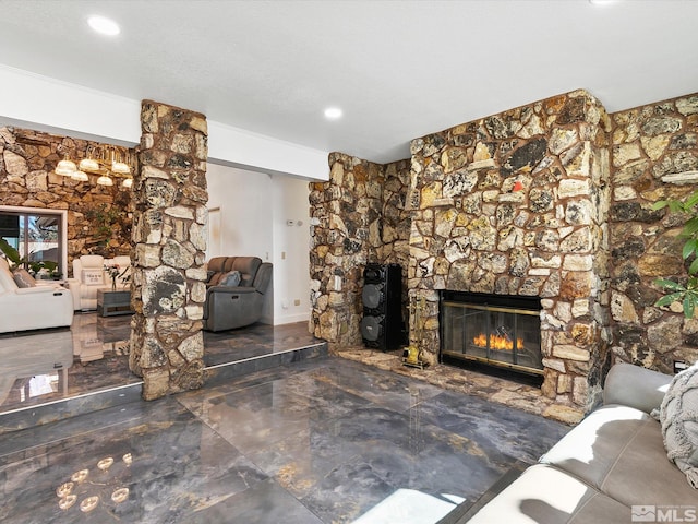 unfurnished living room with a textured ceiling and a fireplace