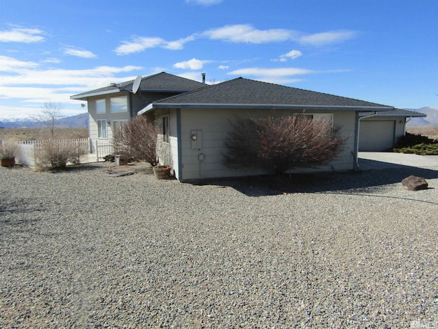 view of property exterior featuring a garage