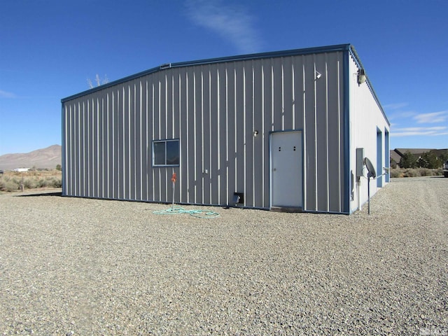 view of outdoor structure featuring a mountain view