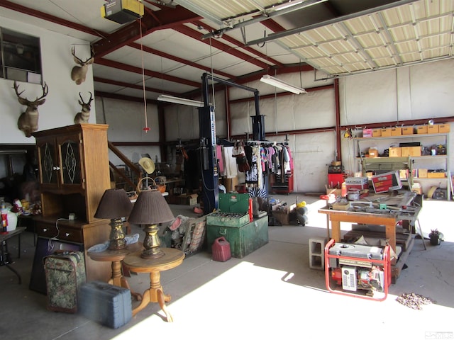 garage featuring a workshop area and a garage door opener