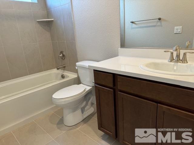 full bathroom featuring vanity, toilet, tile patterned flooring, and shower / bathing tub combination