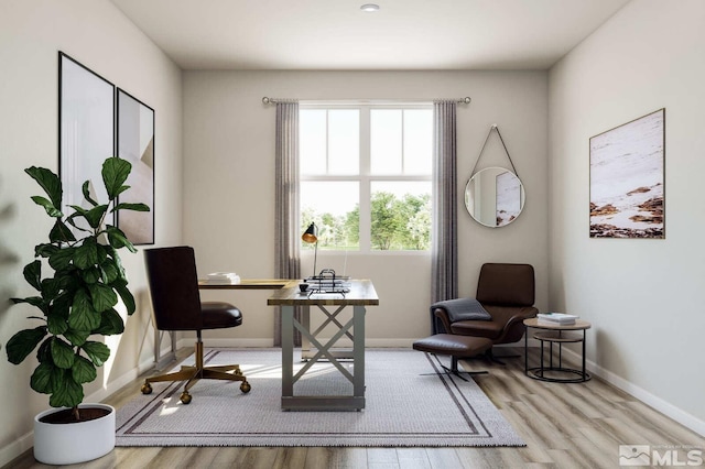 office space featuring light hardwood / wood-style floors