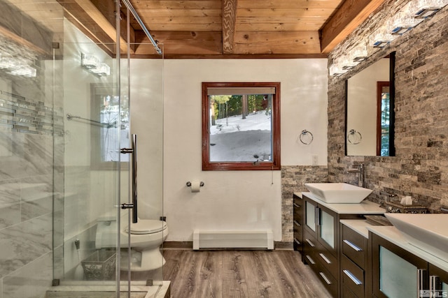 bathroom featuring hardwood / wood-style floors, toilet, wooden ceiling, and vanity