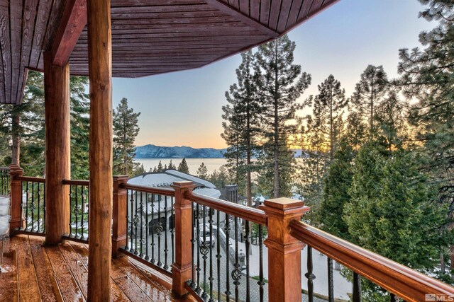 deck at dusk with a water view