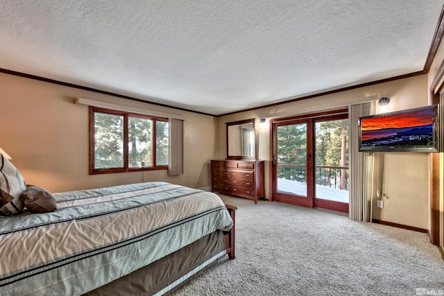 carpeted bedroom with crown molding, a textured ceiling, and access to exterior