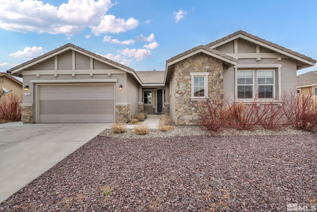 single story home with a garage