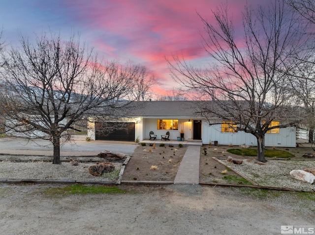 view of front of home with a garage