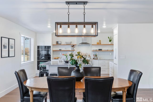 dining room featuring light hardwood / wood-style flooring