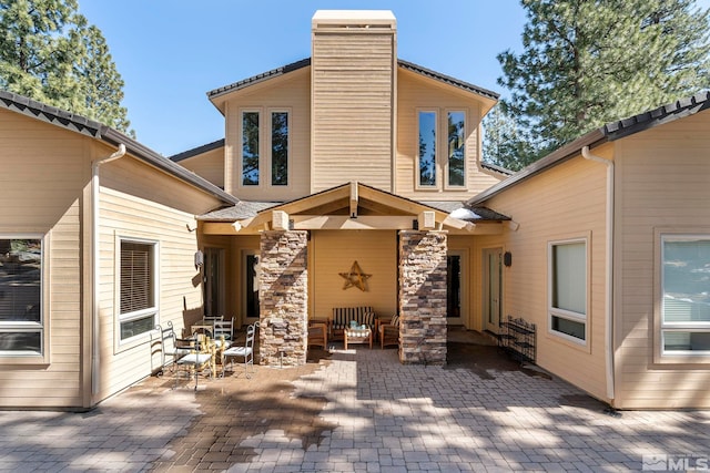 view of front of home with a patio