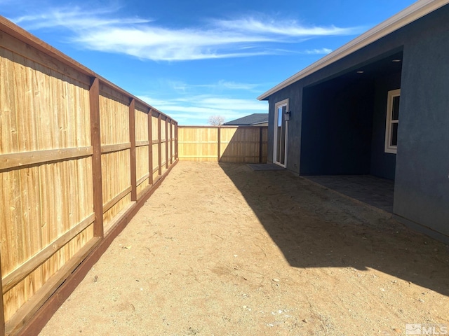 view of yard featuring a fenced backyard