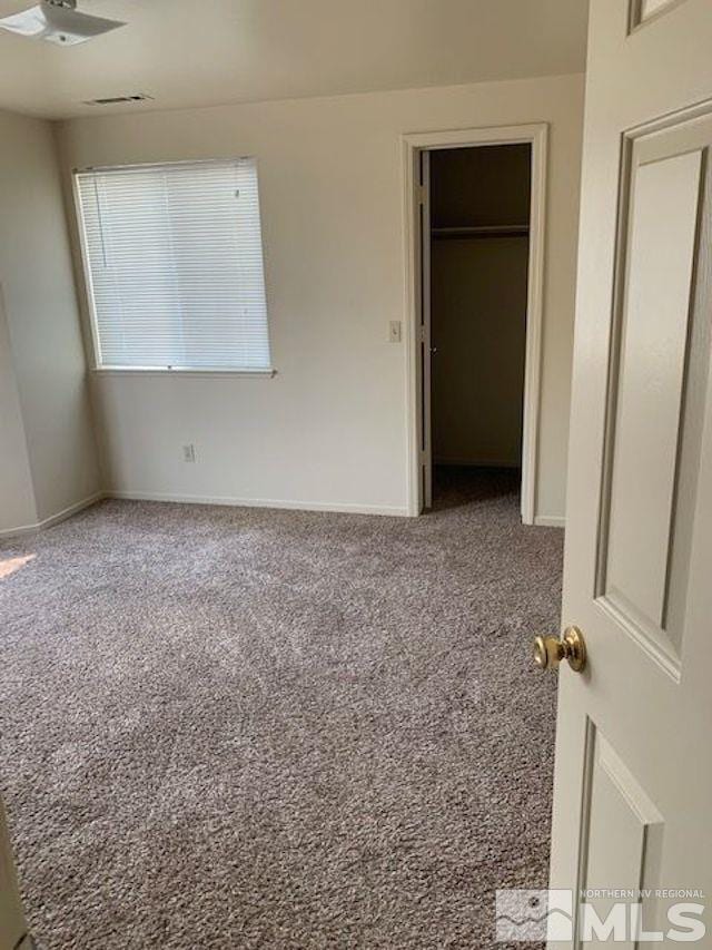 unfurnished bedroom featuring carpet floors