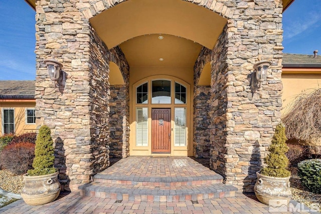 property entrance featuring french doors