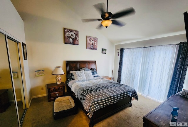 bedroom with a closet, lofted ceiling, dark carpet, and ceiling fan