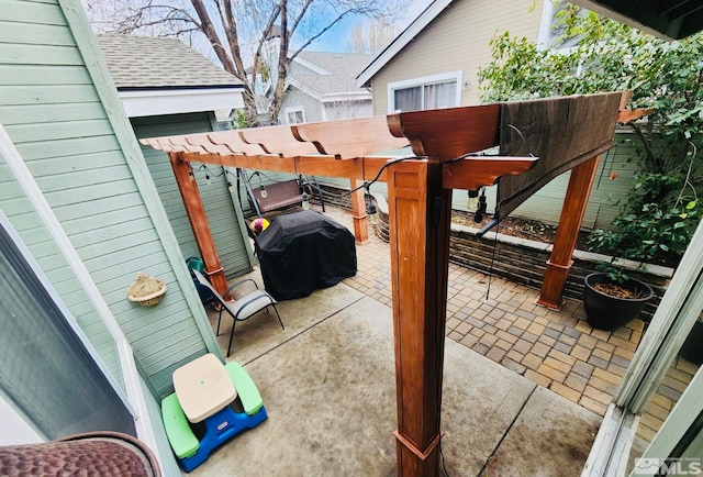 view of patio featuring a pergola and grilling area