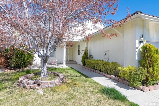 exterior space with a front yard