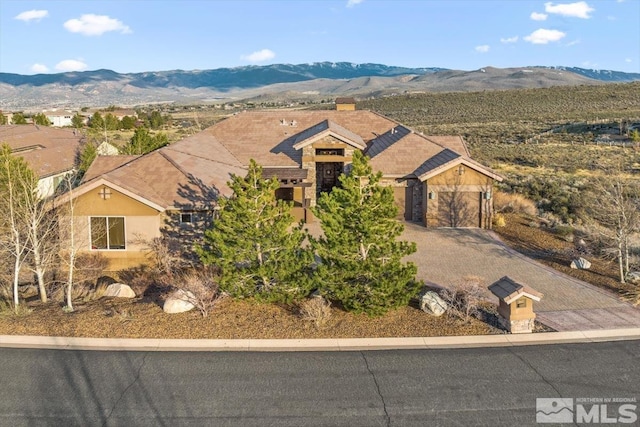 view of front of house featuring a mountain view