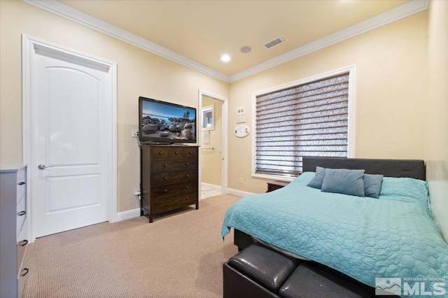 bedroom with light carpet and crown molding