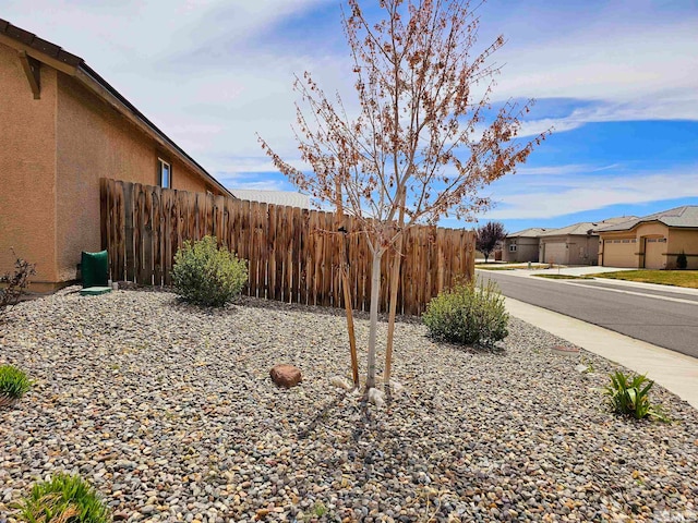 view of yard featuring a garage