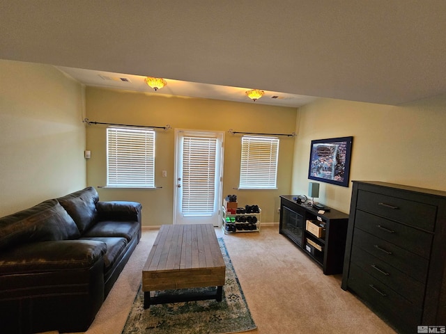 living room featuring light colored carpet