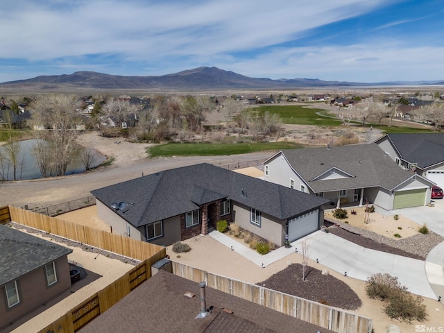 drone / aerial view featuring a mountain view